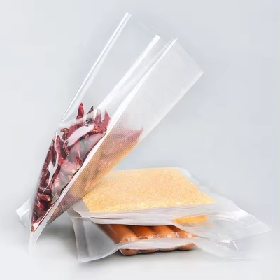 Yüklü Görevli Şeffaf Vakum Çubukları Gıda tasarrufu için Nylon Plastik Ambalajı Büyük Şeffaf Vakum Sealer Çuvalı